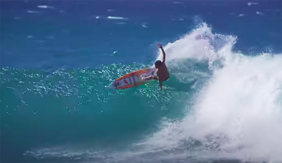 Mason Ho turning on his surfboard at Rocky Point