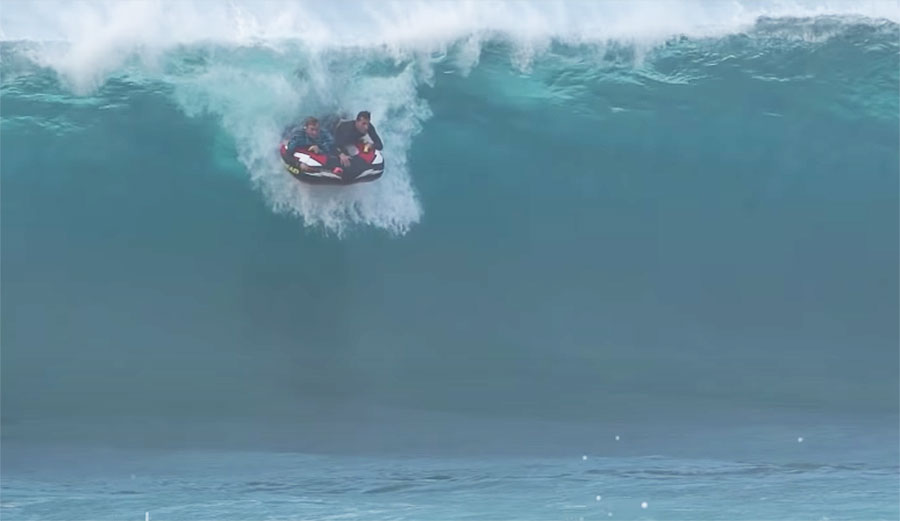 Jamie O'Brien rafting at Pipeline