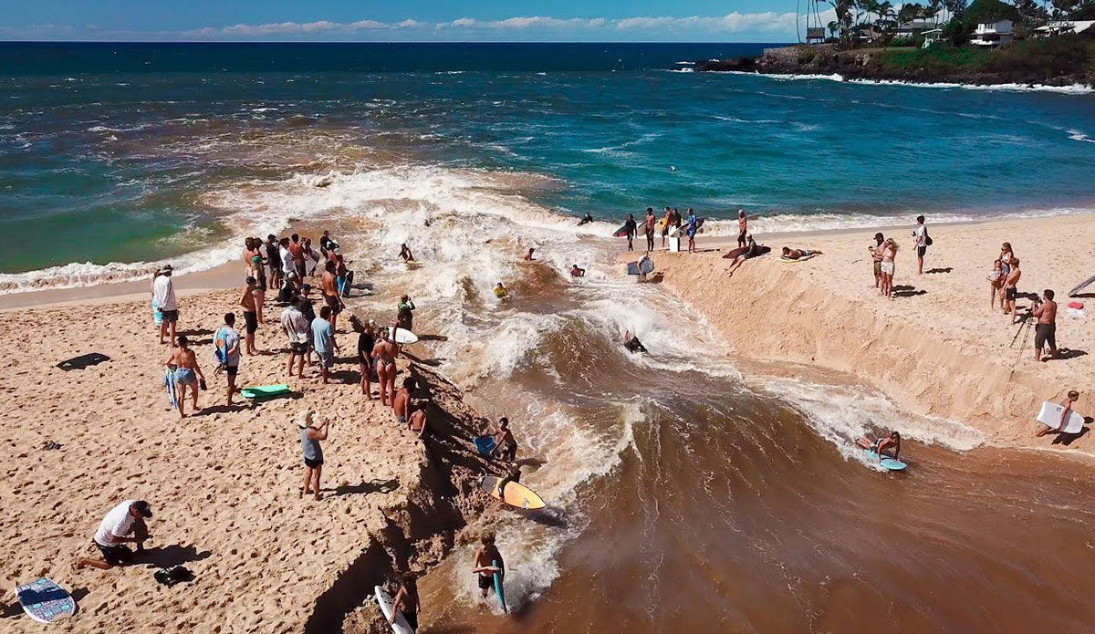 Jamie O'Brien river surfing Waimea Bay