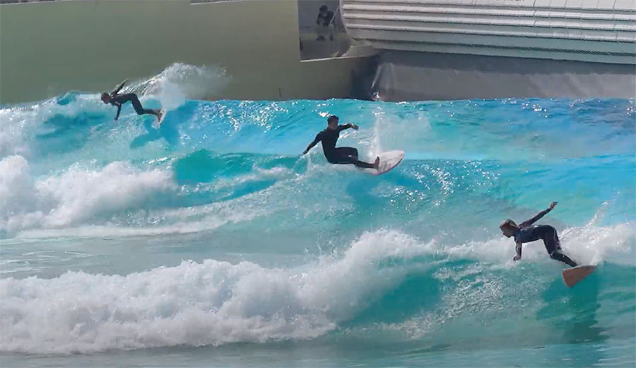 Three surfers surfing at the Wave Park in South Korea