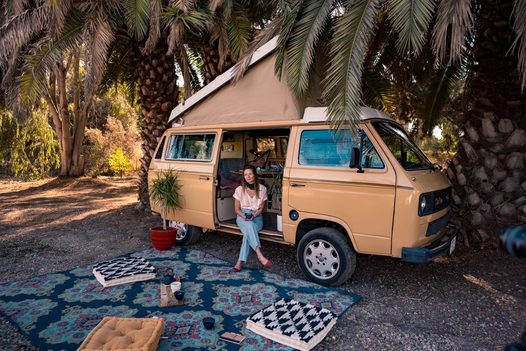Stacie Vanags Salted Spirit Podcast Host in her Van