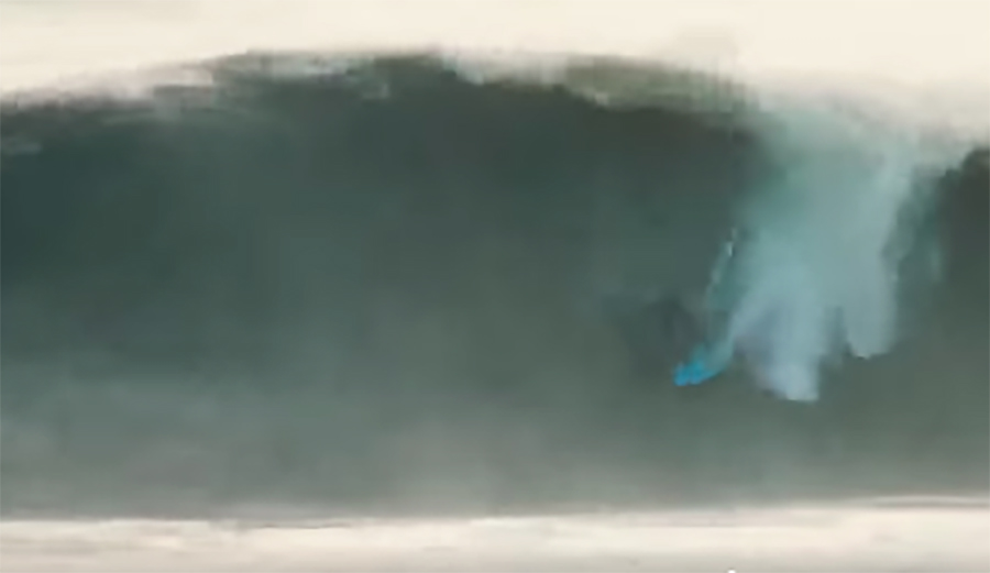 Rob Kelly pulls into a meaty barrel