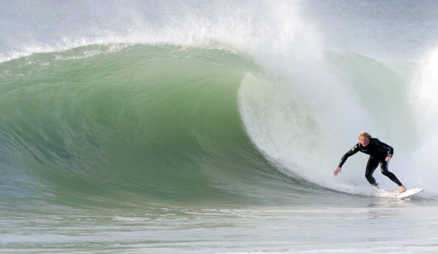 Surfer Ben Gravy sets up to pull into a barrel