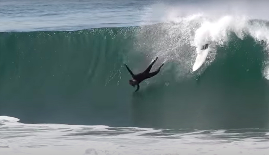 surfer wiping out on a wave