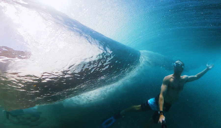 Brett Barley with a GoPro below Pipeline