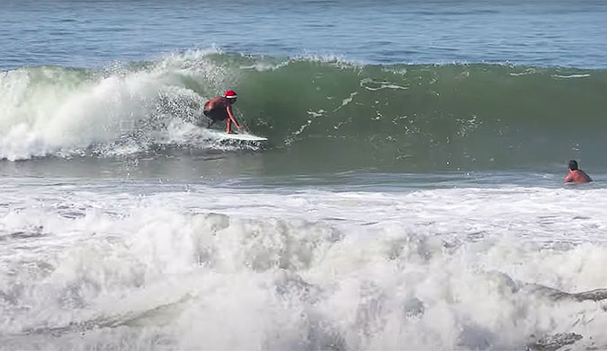 Surfer in a santa hat at Canggu