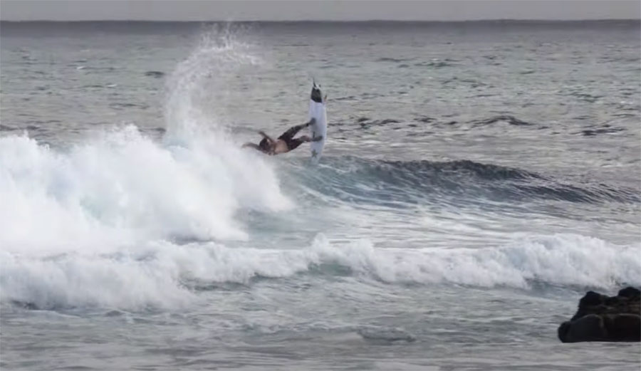 Clay Marzo surfing a left on Maui