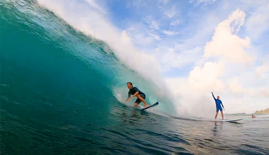 Jackson Lebsack getting barreled on a surfboard