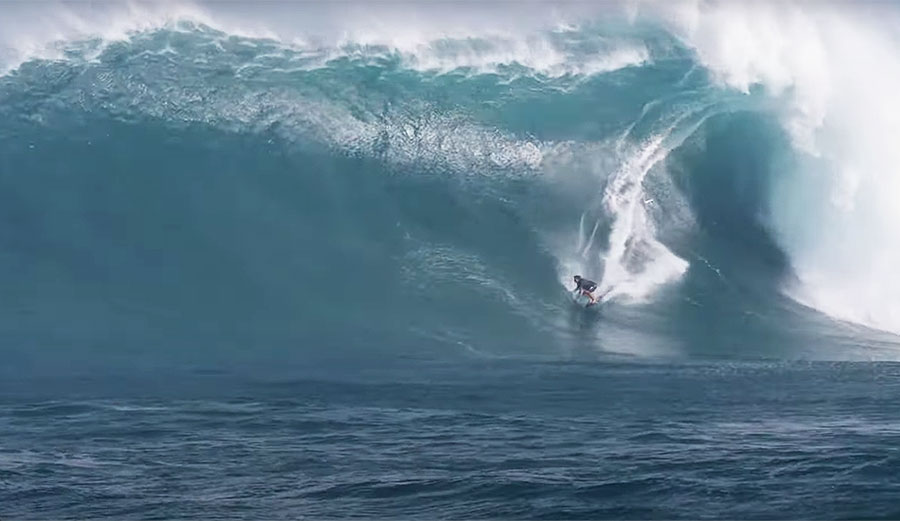 Kai Lenny surfing big wave at Jaws