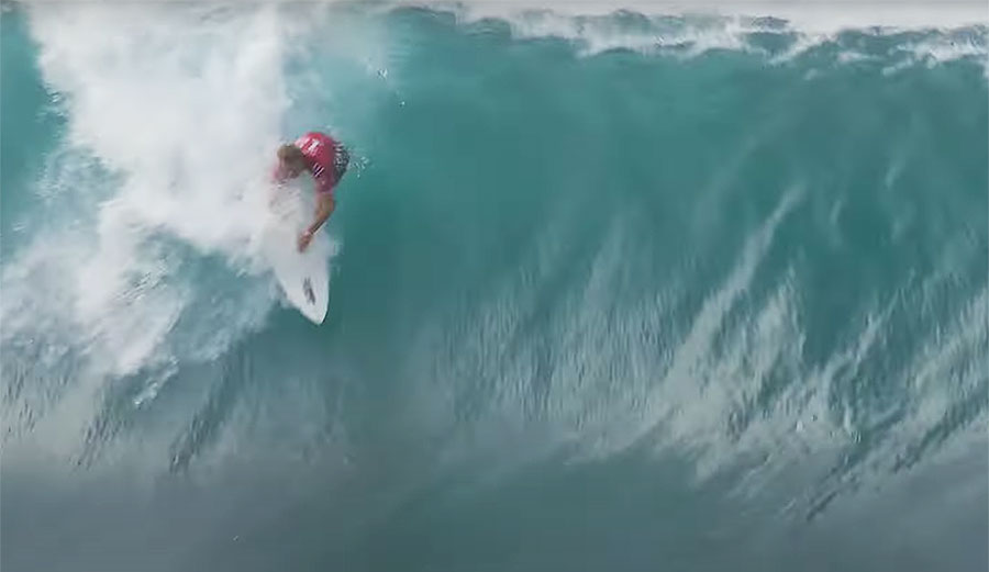 John John Florence surfing wave at Pipeline