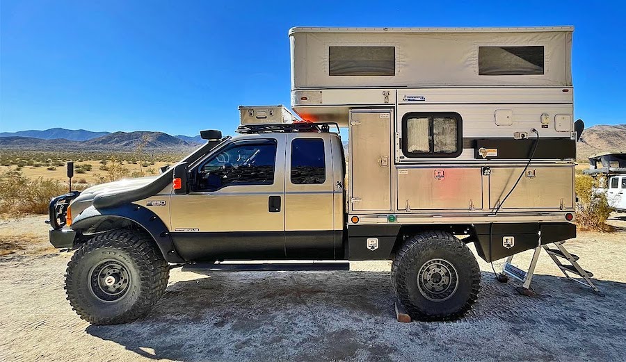 flatbed 4x4 truck with an awesome camper