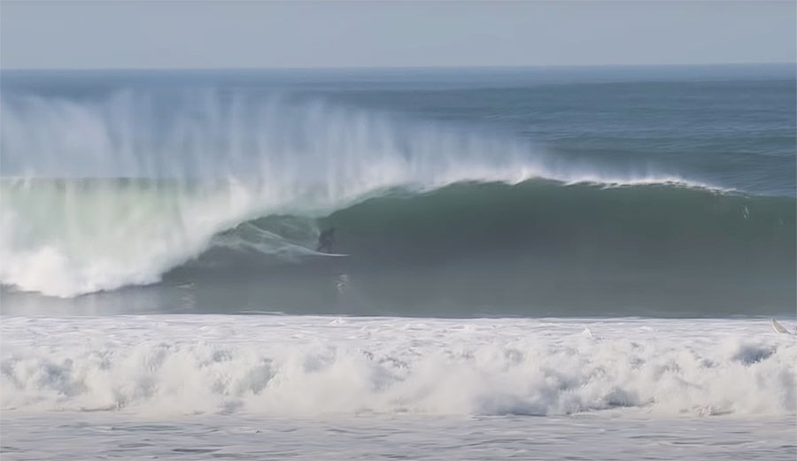 Surfer on big wave at Ocean Beach, San Francisco