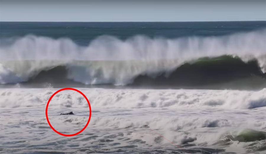 Unidentified Solo Surfer Shows What it Takes to Paddle Out at Maxing Ocean Beach