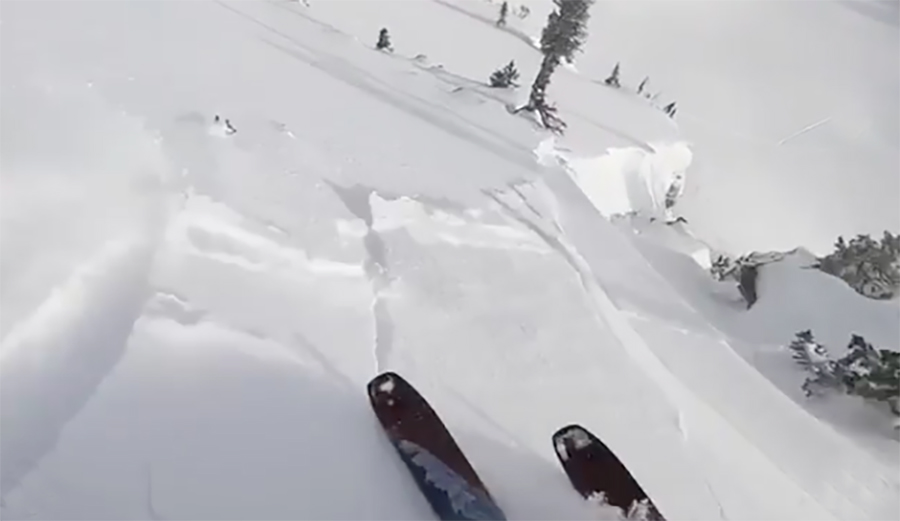 Tim Durtschi rides a spine as it avalanches