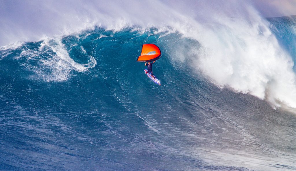 Kai Lenny wing surfing at Jaws