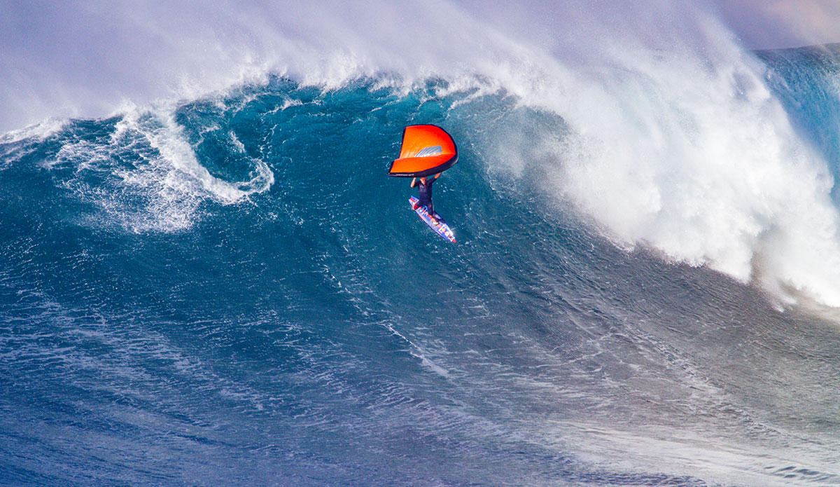 Kai Lenny wing surfing at Jaws