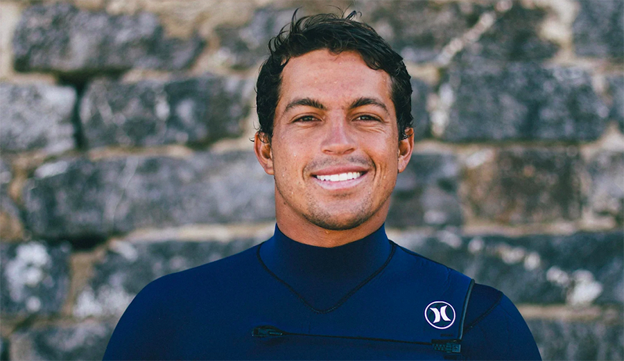 Kai Lenny in his wetsuit ready to surf