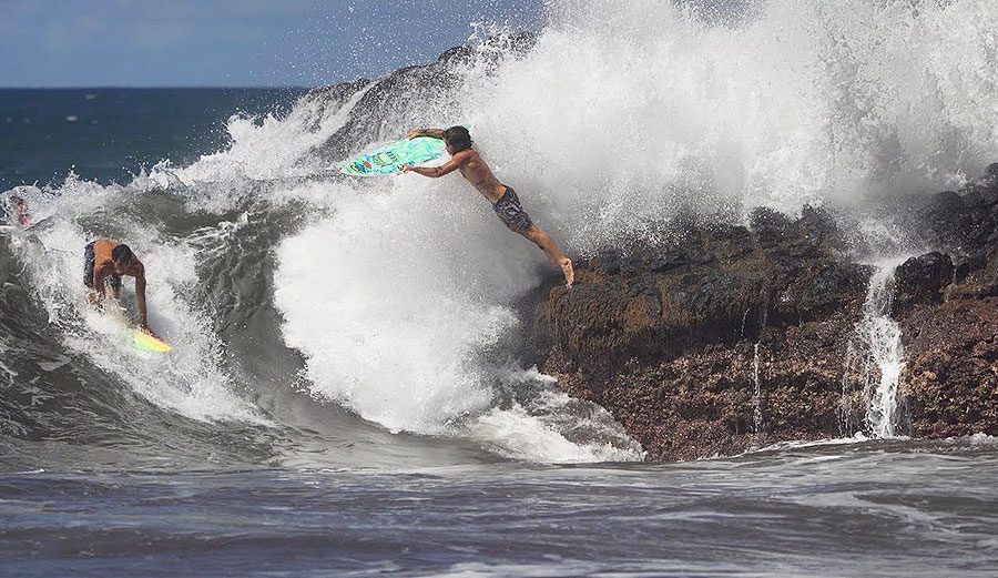 Mason Ho surfing in Hawaii