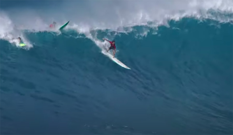 Mason Ho surfs a gun surfboard at big waimea bay