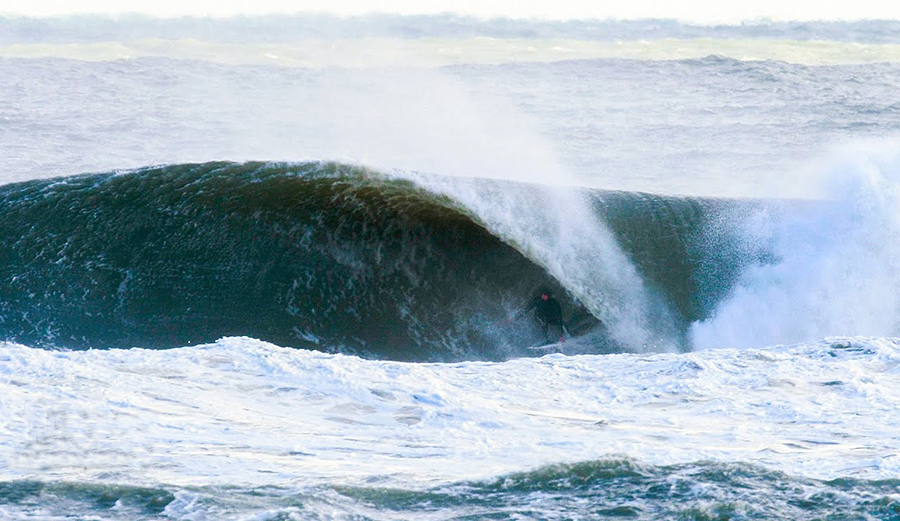 Surfer Brett Barley in a barrel in the Outer Banks