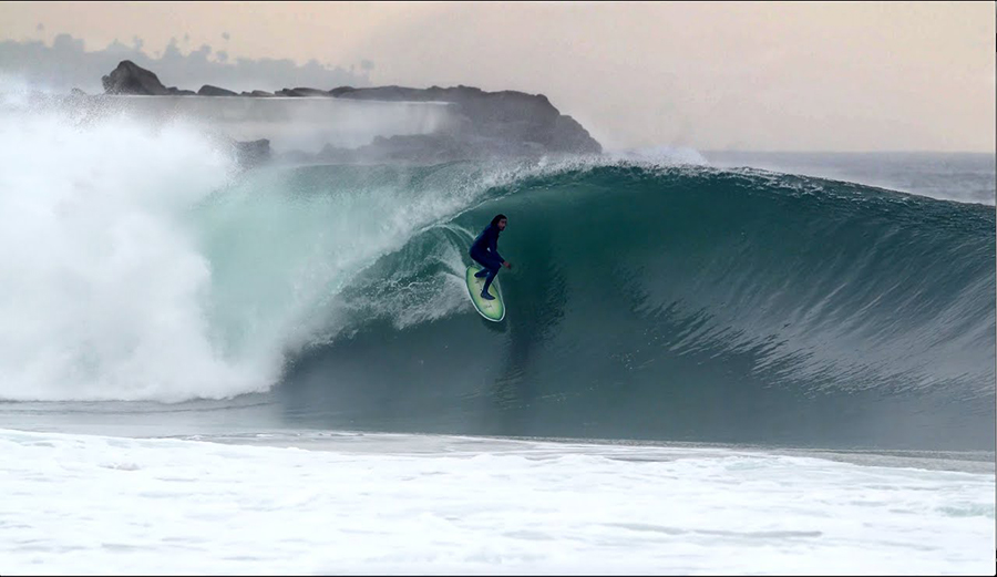 A surfer gets barreled in Los Angeles