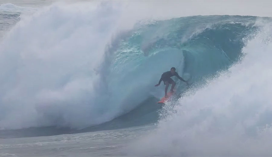 Mark Healey surfing the left at Waimea Bay