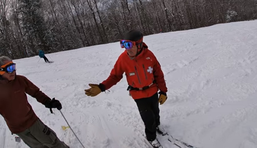 ski patrol pulls passes for out of bounds skiing at loon mountain