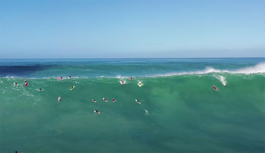 Big wave surfers at Waimea Bay
