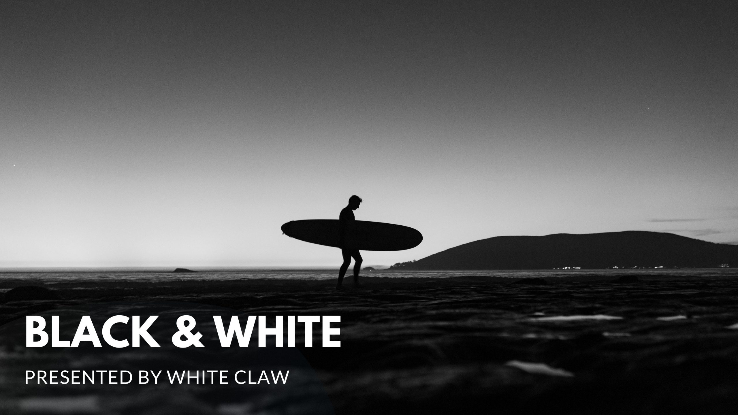 Black and White Walking Surfer Sillhouette