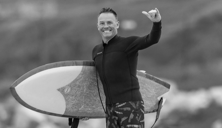 World Surf League CEO Erik Logan goes for a surf