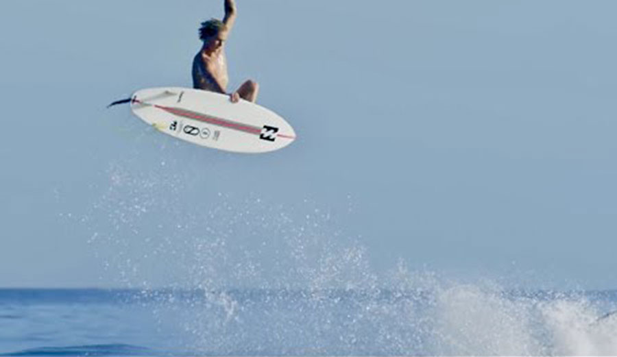 Finn McGill surfing on a Slater Designs surfboard