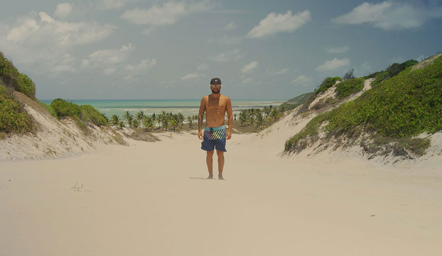 Italo Ferreira standing on a beach