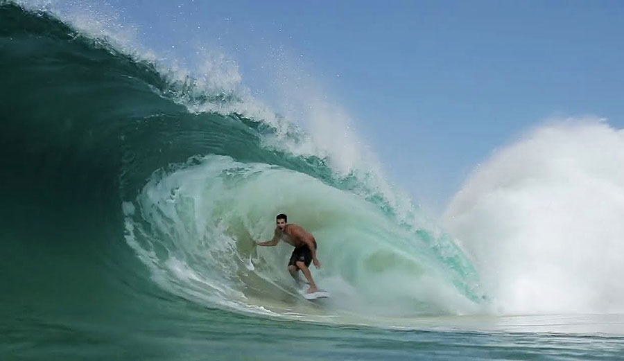 surfer in barrel at Kirra