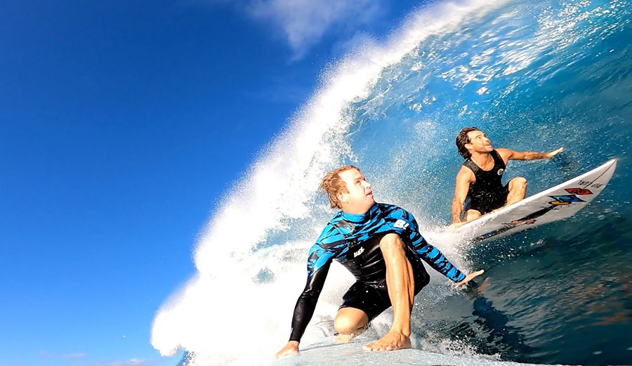 Jamie O'Brien Mason Ho in a Pipeline barrel together
