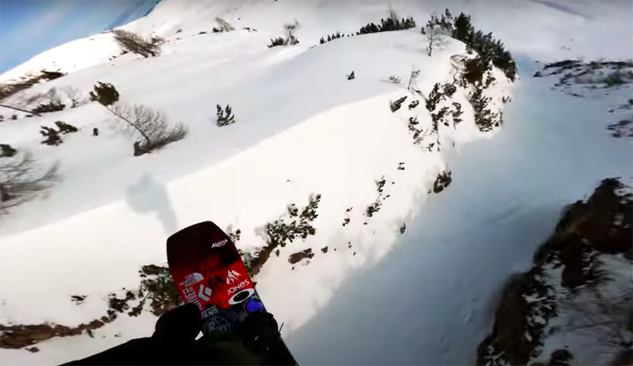 Snowboarder Victor de Le Rue hits a gap during a Freeride World Tour event