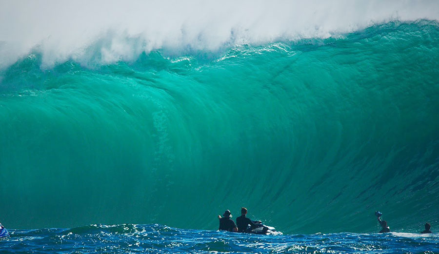 New South Wales surfers looking at wave