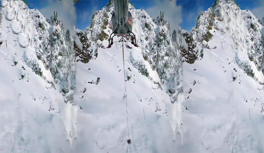 A helicopter bombs slopes to control avalanches in Chamonix