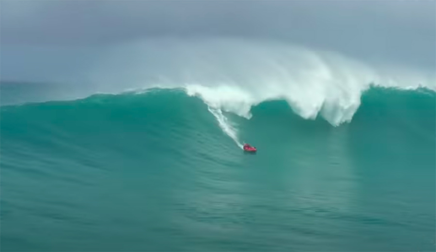 Riding a big wave on a raft