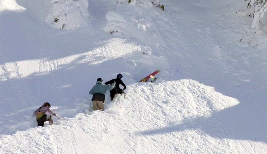 Skier Ahmet Dadali is buried upside down in the snow