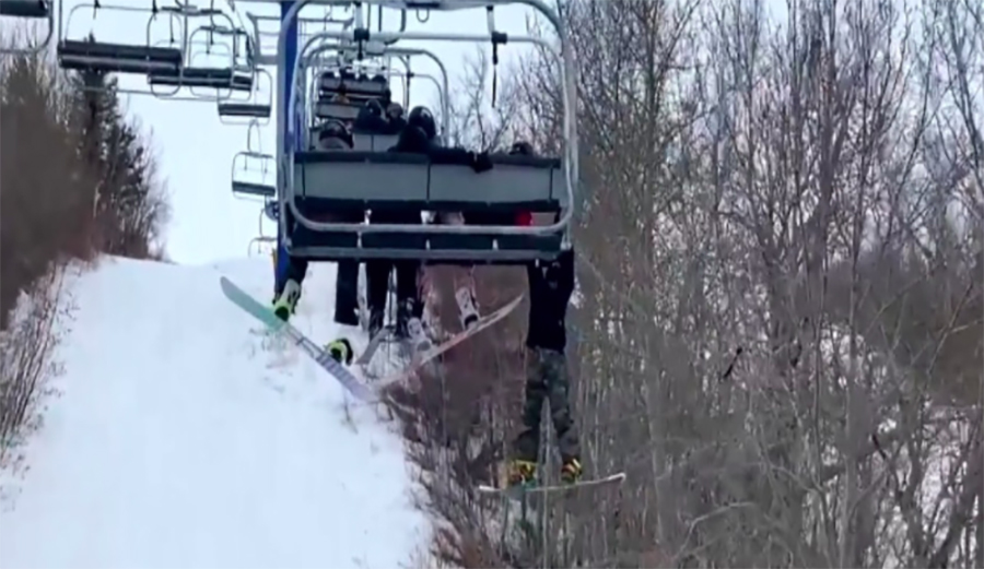 A 12-year-old hangs from a chairlift in Saskatchewan, Canada