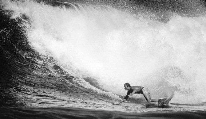 Simon Anderson, bottom turning on a big wave