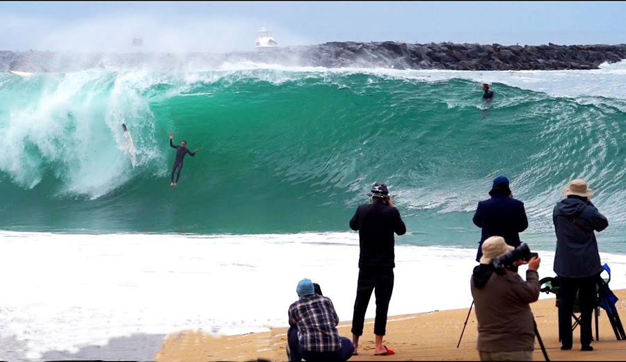 A surfer wrecks at the wedge in newport