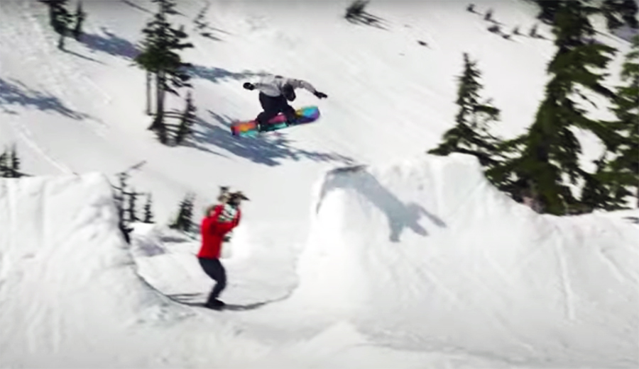A snowboarder hits a feature at the Brain Bowl Sessions at Mt. Baker
