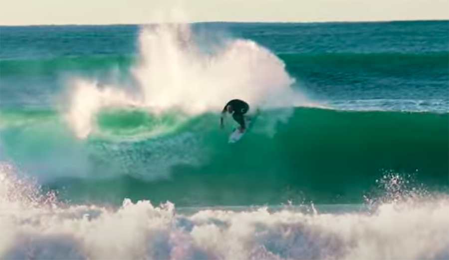 Mick Fanning surfs a wave at Narrabeen