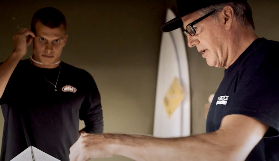 Jon Pyzel making surfboard with Koa Smith