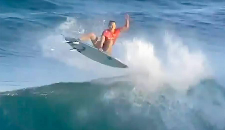 Carissa Moore throws an air on a wave in Newcastle
