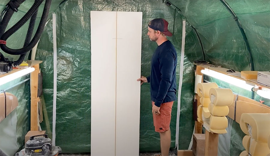 shaping a surfboard