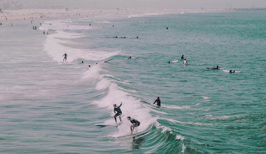 surfers at venice beach unsplash victoria palacios