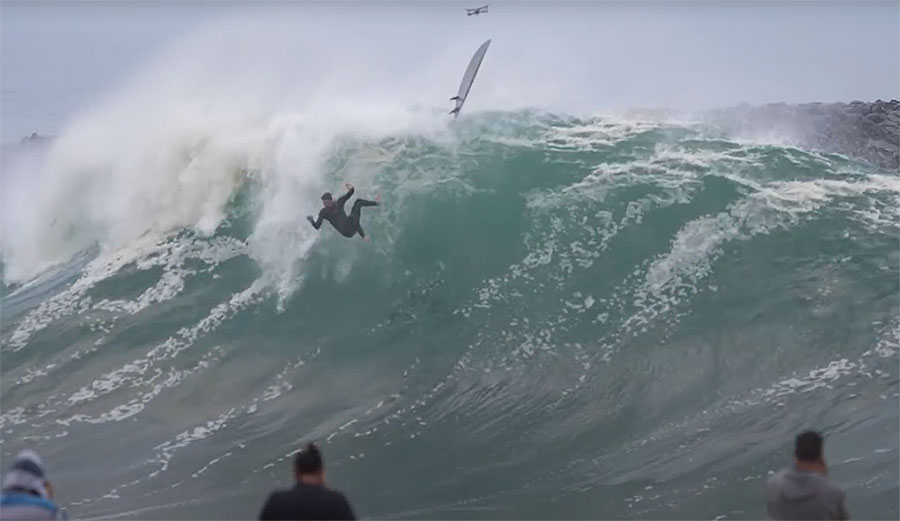 Surfer falling at the Wedge