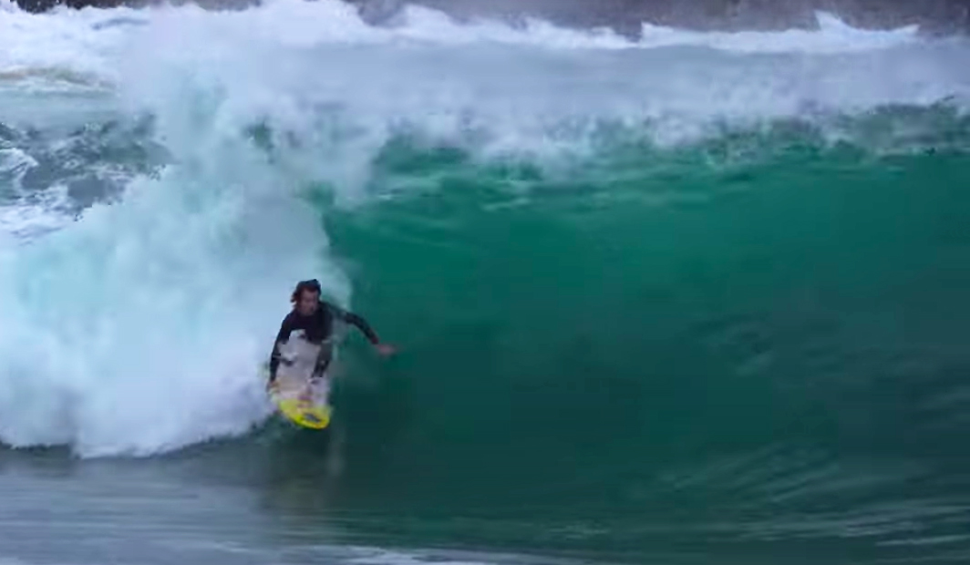 Mason Ho pulls into a barrel at the Wedge